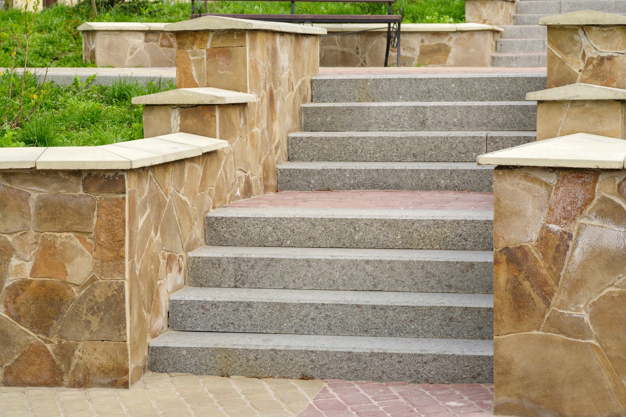 Stone staircase with decorative stone walls outdoors