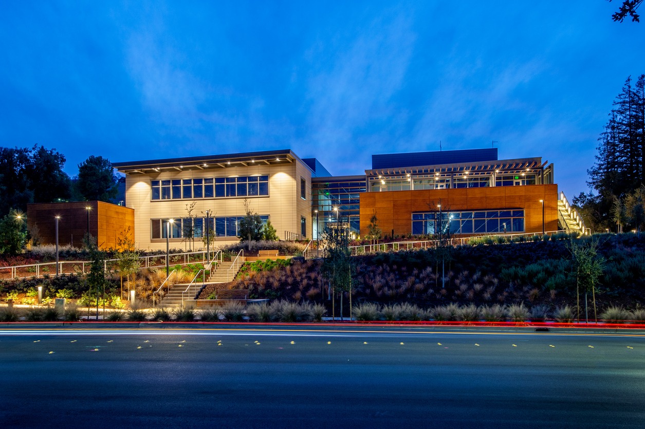 Modern office building illuminated at dusk