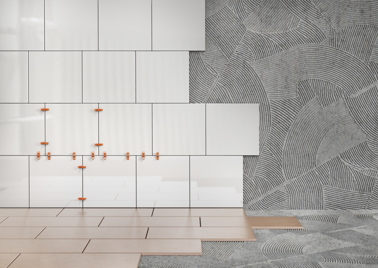 White wall tiles being installed with spacers